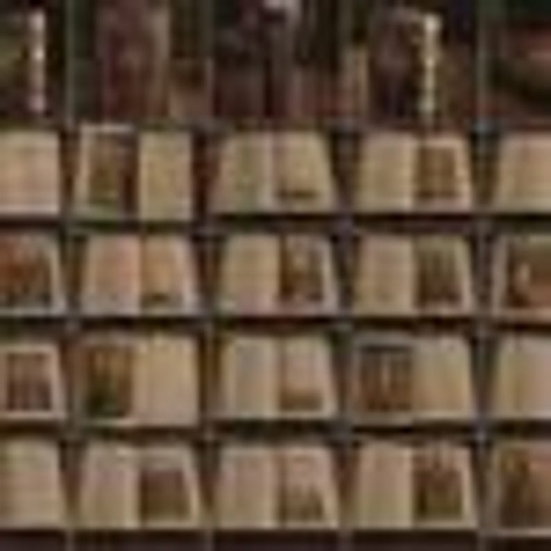 May include: A grid of twenty open books arranged in four rows and five columns. Each book displays two pages of printed text with dark brown covers and aged, off-white paper. The books are positioned upright in a structured, uniform display.