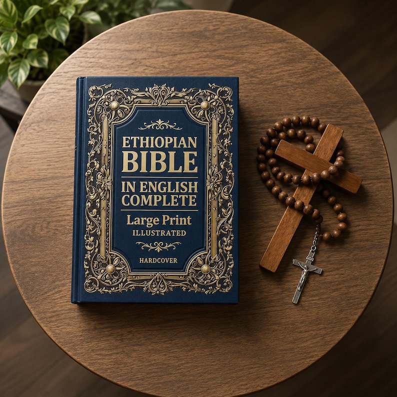 May include: A dark blue hardcover book titled ETHIOPIAN BIBLE IN ENGLISH COMPLETE Large Print ILLUSTRATED with gold ornate filigree borders. Beside the book lies a wooden cross with brown prayer beads and a silver crucifix pendant attached.