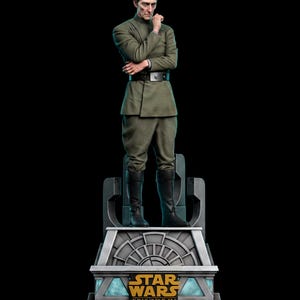 May include: A detailed collectible statue of Grand Moff Tarkin wearing an olive green military uniform with a black belt and tall black boots. The figure stands on a grey base featuring the Star Wars Episode IV A New Hope logo in gold text.
