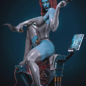 May include: A collectible statue of a blue-skinned character with red hair, wearing a grey bodysuit and thigh-high boots. The figure holds a curved blade and a handgun, sitting on a mechanical base with a glowing digital screen displaying data.