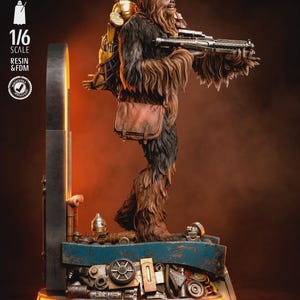 May include: A 1/6 scale resin and FDM figurine of a brown, fur-covered Wookiee character holding a blaster rifle. The figure wears a brown satchel and a gold-coloured backpack, standing on a detailed mechanical base with text reading TESTED PRESUPPORTED.