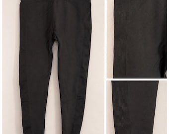 Leggings negros sin costuras SET Active con logo en el tobillo