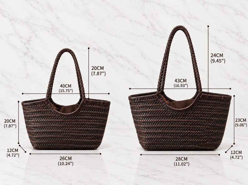 May include: Two dark brown woven tote bags with braided handles. The smaller bag measures 40 cm wide, 20 cm high, and 12 cm deep. The larger bag measures 43 cm wide, 23 cm high, and 12 cm deep, with a handle drop of 24 cm.