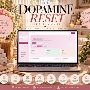 Puede incluir: Un portátil que muestra una interfaz de planificador digital titulada The Dopamine Reset Life Planner. La pantalla muestra un panel con secciones para planificación diaria, hábitos y objetivos. El texto incluye Plan, Focus, Reset, Thrive.