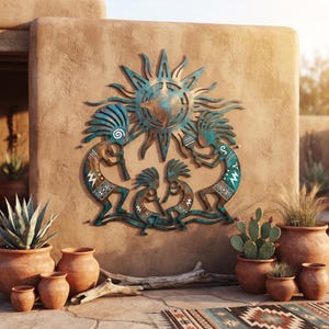 May include: A metal wall art piece featuring a central sun motif surrounded by four stylized figures playing flutes and percussion instruments. The artwork has a weathered copper and teal patina finish with white geometric patterns on the figures.