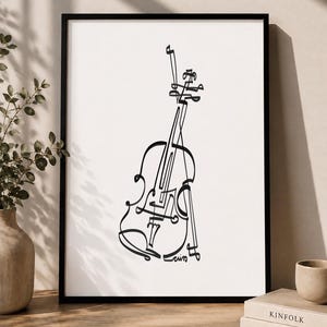 May include: A black and white line art print featuring a stylised violin illustration inside a thin black frame. The artwork uses a single continuous black line to depict the shape of a violin and bow against a plain white background.