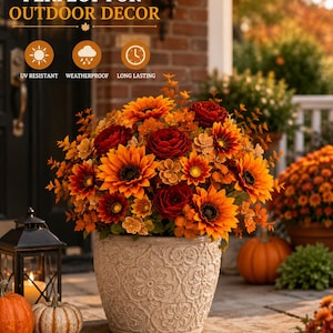 May include: A decorative planter filled with artificial orange sunflowers and deep red roses. The beige pot features a raised floral relief pattern. Text on the image reads: PERFECT FOR OUTDOOR DECOR, UV RESISTANT, WEATHERPROOF, LONG LASTING.