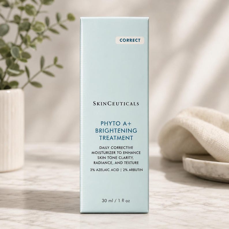 May include: A rectangular light blue SkinCeuticals Phyto A+ Brightening Treatment box. The text reads: CORRECT, SKINCEUTICALS, PHYTO A+ BRIGHTENING TREATMENT, DAILY CORRECTIVE MOISTURIZER TO ENHANCE SKIN TONE CLARITY, RADIANCE, AND TEXTURE, 3% AZELAIC ACID | 2% ARBUTIN, 30 ml / 1 fl oz.