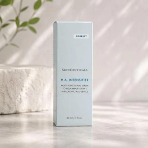 May include: A light blue rectangular skincare product box labeled SkinCeuticals H.A. Intensifier multi-functional serum. The front of the box features the text Correct, the brand name, product name, description, and a volume of 30 ml / 1 fl oz.