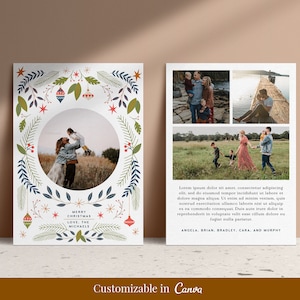 May include: A Christmas card with a festive wreath design featuring a family photo in a circle. The wreath is decorated with red, green, and blue ornaments, stars, and leaves. The text "Merry Christmas Love, The Michaels" is printed below the photo.