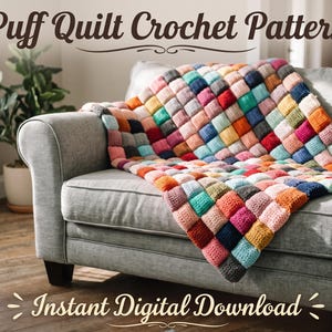 May include: A multi-colored puff quilt crochet blanket featuring a grid of raised, square-shaped stitches in various shades of pink, blue, orange, yellow, and green. The text Puff Quilt Crochet Pattern and Instant Digital Download appear.