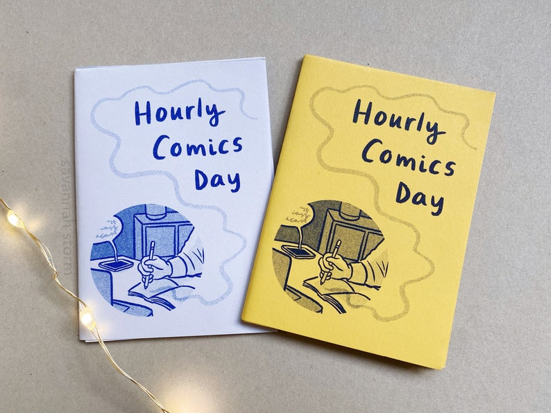 Two mini zines called Hourly Comics Day, one printed on lilac paper and one on yellow paper.