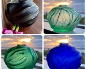 Beautiful collectible Lalique Paris Royal Palm soliflore vases in original box. cobalt blue, black, aquamarine and emerald. Priced per vase.