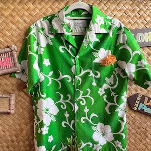 Fabulous soft cotton Pomare Hawaii Aloha shirt. Fantastic large white hibiscus with vibrant green.  Finest Aloha shirt! 1960s-70s