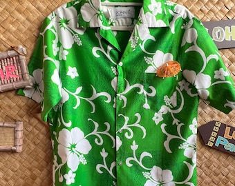 Fabulous soft cotton Pomare Hawaii Aloha shirt. Fantastic large white hibiscus with vibrant green.  Finest Aloha shirt! 1960s-70s