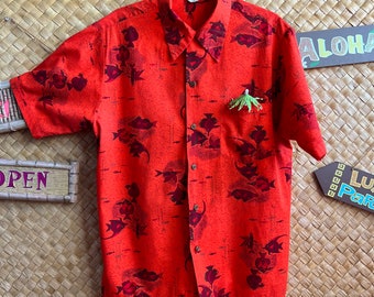 Fab collectible vintage Hawaiian Aloha shirt.  Size Small/Medium. 100% cotton.  Made in Hawaii - Deep red color with tropical fish.