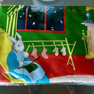 How sweet - Goodnight Moon cuddle blanket Quilt kit. Adorable fabric pieces with the &quot;hushing&quot; bunny piece as the main fabric piece.