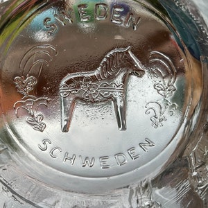 Beautiful thick glass Kosta Boda bowl.Wonderful graphics around the bowl.  Imprinted Sweden Schweden.  Kjell Engman design.