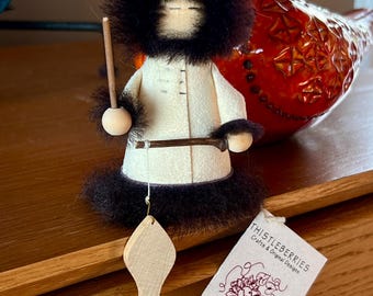 A collectible 1990s Thistleberries by Ruth Holland figurine. "The Fisherman" Made of hide, wood and porcupine quills.