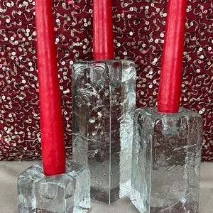 Beautiful Blenko-Vintage clear glass ice pillar candle holders in three sizes. Gorgeous heavy glass statement pieces. Red candles included.