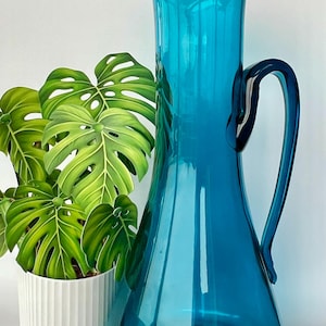 Gorgeous Blenko art glass. Absolutely beautiful - large deep turquoise blue elongated pitcher. Wayne Husted design. Incredible Blenko.