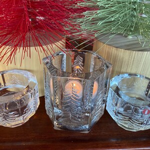 Lovely! Two lovely small Iittala kuusi (spruce tree) design candle holders and one larger Kuusi candle holder-Finland.  Jorma Vennola design