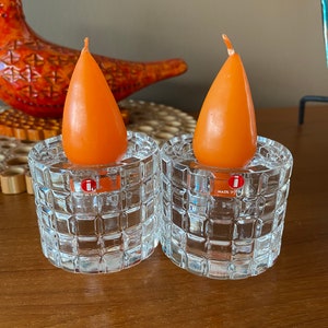 Two lovely textured votive candle holders - Erika - Iittala - designer Ken Benson.  Made in Finland - orange mid century candles included.