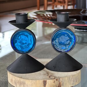 Two beautiful mid century modern Ystad Metall candle holders with blue glass. Artist Gunnar Ander. Made in Sweden. Beautiful vintage decor.