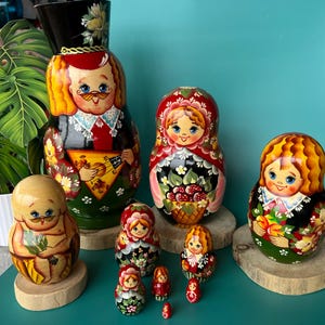 An amazing huge 10 piece Matryoshka nesting doll. Hand painted with traditional Russian colors and designs. So many details. Wonderful!
