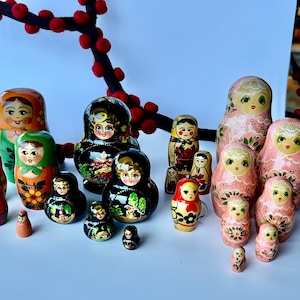 Five lovely vintage Matryoshka/nesting dolls. Made in Russia. Beautiful colors and shapes. Traditional and ornate. Lovely collectible dolls.