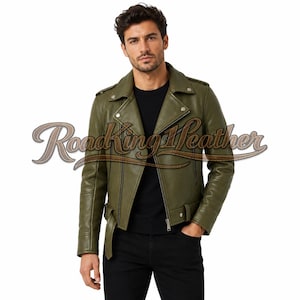May include: An olive green leather motorcycle jacket featuring a wide notched lapel, silver-tone metal hardware, a front zipper closure, shoulder epaulets, and a buckled waist belt. The text RoadKingLeather is overlaid across the center.