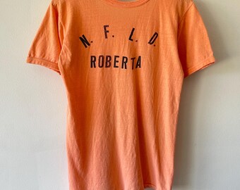 Vintage jaren 70 dun NFLD Roberta Graphic T-shirt oranje helder ringer slim
