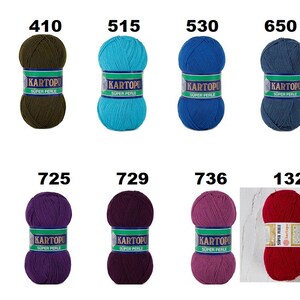 May include: A collection of ten balls of yarn in various colors, including green, blue, purple, and red. Each ball has a label with a number and the brand name "KARTOPU SUPER PERLE". The yarn is likely for knitting or crocheting projects.