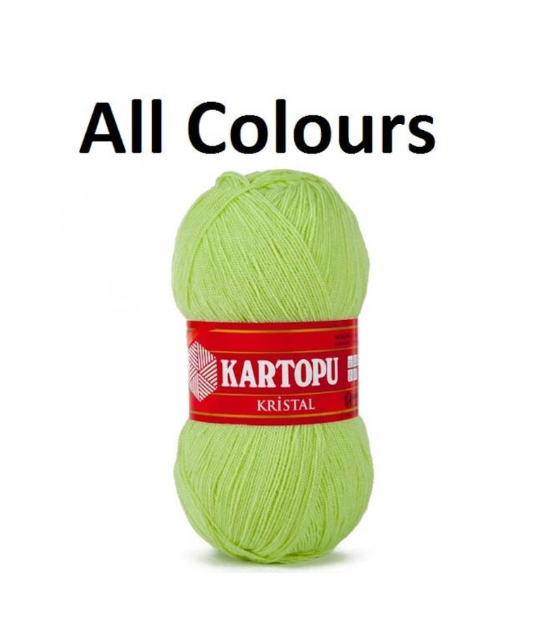 May include: A ball of light green yarn with a red label that says "KARTOPU KRISTAL".