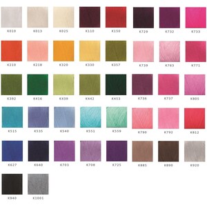 May include: A color chart of yarn samples with different colors and textures. The chart is labeled with the yarn color codes, such as K010, K013, K025, K110, K150, K729, K732, K733, K210, K218, K320, K330, K357, K739, K763, K771, K392, K416, K439, K442, K453, K736, K737, K805, K515, K535, K540, K551, K559, K790, K792, K812, K627, K640, K703, K708, K725, K885, K890, K920, K940, K1001.