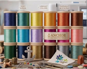 May include: A collection of Anchor machine embroidery thread spools in various colors, featuring a silver anchor-shaped tag with the text Premium Quality. The spools are labeled with the text Silky Sheen, Vibrant Colors, and Durable & Strong.