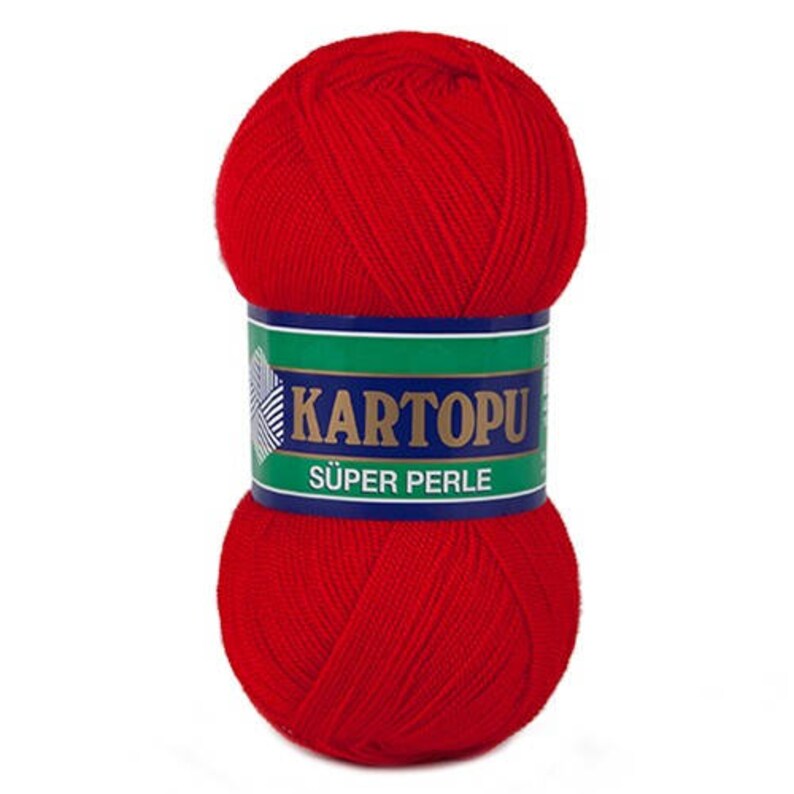 May include: A vibrant red ball of yarn with a label that reads "KARTOPU SUPER PERLE" in white and gold lettering. The label is green and blue. This yarn is likely used for knitting or crocheting projects.