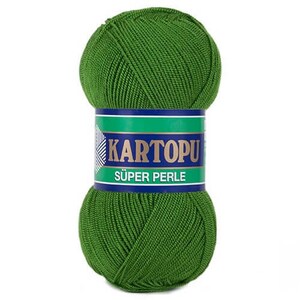 May include: A ball of green yarn with a label that reads "KARTOPU SUPER PERLE". The yarn is a vibrant shade of green, and the label has blue and green accents. The yarn is tightly wound and appears soft.