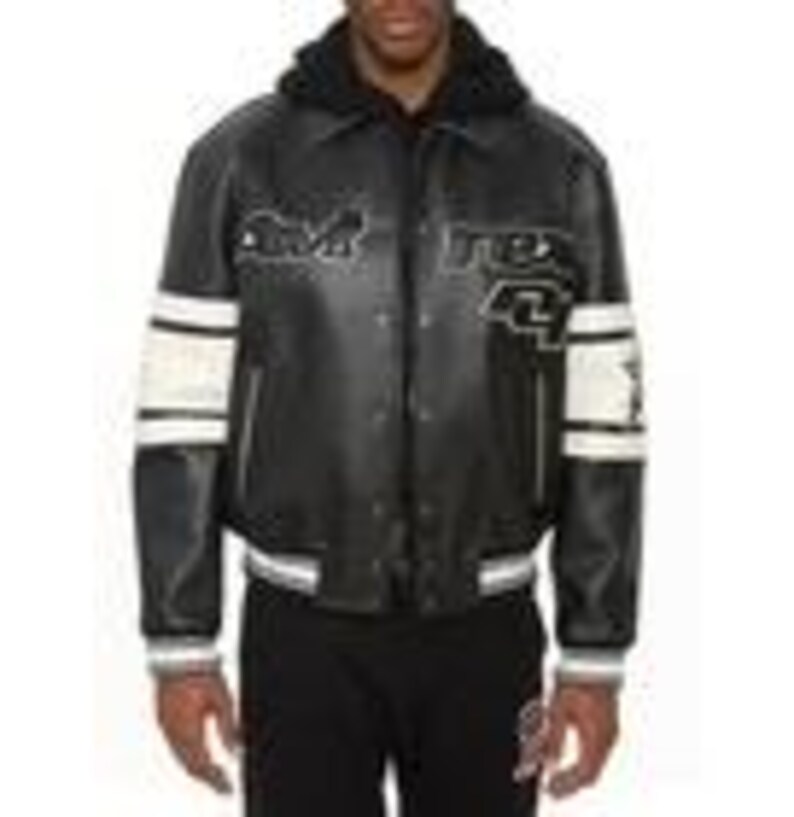 May include: A black leather jacket featuring a black hood, a front snap-button closure, and white striped detailing on the sleeves. The chest displays embroidered text reading "avirex" and "4" in a bold, stylized font with white outlines.