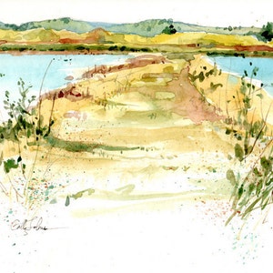 May include: A watercolor painting of a sandy path leading to a body of water. The path is surrounded by green foliage and the water is a light blue color. The background features a distant landscape with hills and trees.