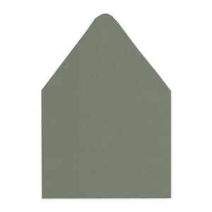 May include: A sage green envelope with a pointed triangular flap. The envelope features a smooth, matte texture and a clean, symmetrical design. The paper is a solid, muted green color throughout, presenting a simple and functional stationery item.