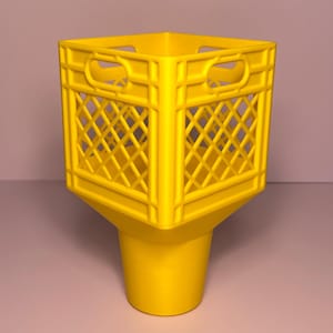 May include: A bright yellow plastic container featuring a square, open-top crate design with a diamond-patterned lattice structure on the sides and integrated handles, transitioning into a solid, tapered cylindrical base at the bottom.