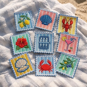 May include: Nine square embroidered patches with scalloped edges, featuring designs of lemons, a blue seashell, a red lobster, a red hibiscus flower, a tin of sardines, a pink cocktail, an oyster with a pearl, a red crab, and green olives.