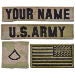 May include: A set of four embroidered military-style patches on a camouflage background. The top two rectangular patches feature the black text YOUR NAME and U.S. ARMY. The bottom left square patch shows a chevron rank, and the bottom right is a flag.