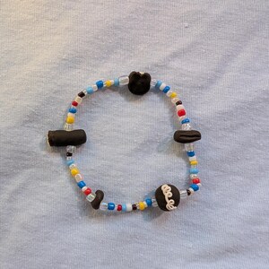 Snack Cake Beaded Handmade Stretch Bracelet With Cupcake, Swiss Roll, Chocolate Zinger, and Donut Handmade Polymer Clay Beads
