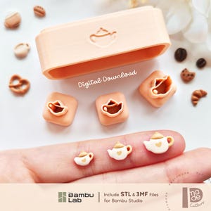 May include: A peach-colored rectangular frame and three square-based cutters featuring teapot shapes. The text Digital Download is visible. Three small white and peach teapot-shaped charms are displayed. The Bambu Lab logo and text are present.