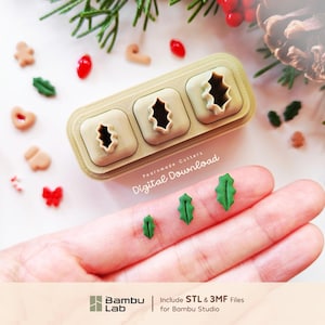 May include: A beige 3D printed cutter set with three holly leaf shapes, labeled Pearnmade Cutters Digital Download. Three small green holly leaf cutouts are displayed. The bottom text reads Bambu Lab Include STL & 3MF Files for Bambu Studio.