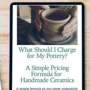 May include: A digital tablet displaying a guide titled What Should I Charge for My Pottery? A Simple Pricing Formula for Handmade Ceramics. A simple formula so you never underprice your work again. The screen shows an image of hands shaping clay.