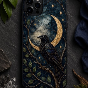 May include: A black smartphone case featuring a detailed illustration of a dark raven perched on a tree branch against a backdrop of a textured crescent moon, scattered golden stars, and deep blue swirling clouds with green leaves.