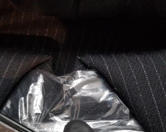 Manzini 2 piece suit. Made in Italy. Vintage. Gently worn & in excellent condition.